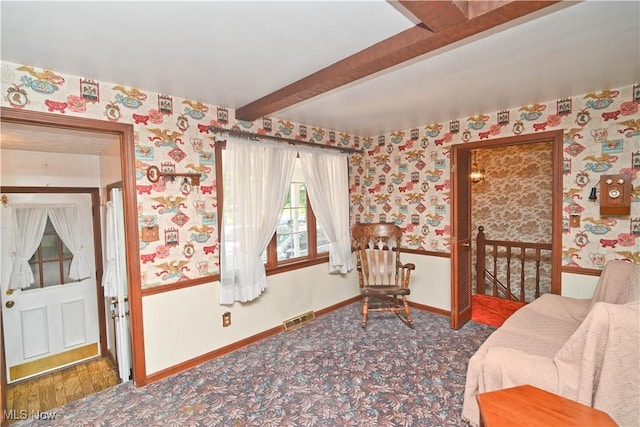 5735 Herbert Rd, Canfield, OH 44406 - living area featuring beam ceiling, wallpapered walls, an upstairs landing, and carpet floors