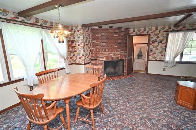 5735 Herbert Rd, Canfield, OH 44406 - dining area with beam ceiling, a chandelier, a fireplace, and carpet