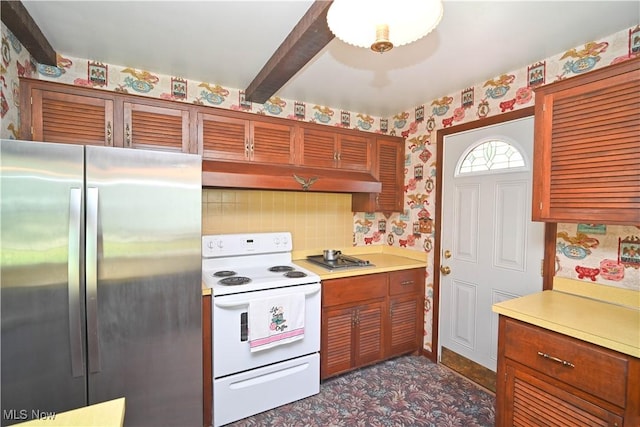 5735 Herbert Rd, Canfield, OH 44406 - kitchen featuring freestanding refrigerator, white electric range, wallpapered walls, light countertops, and decorative backsplash