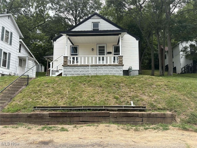 1624 Orchard St, Coshocton, OH 43812 - view of front facade featuring covered porch