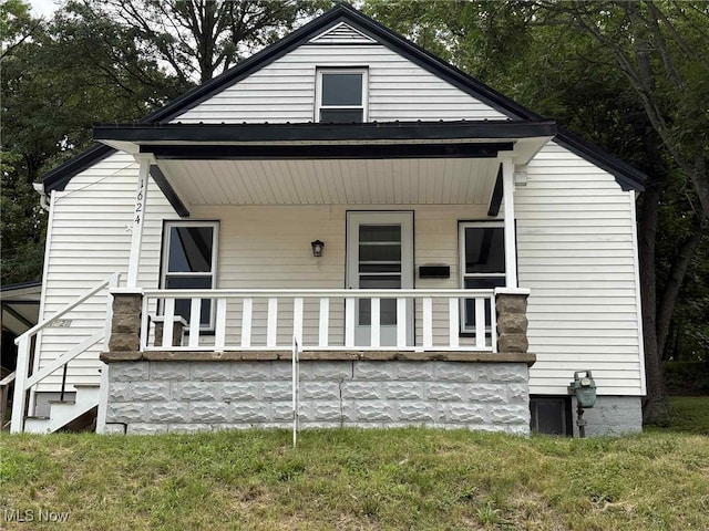 1624 Orchard St, Coshocton, OH 43812 - rear view of property featuring covered porch