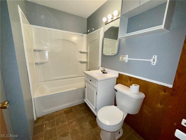 218 Vine St, Coshocton, OH 43812 - bathroom with vanity, washtub / shower combination, and tile patterned floors