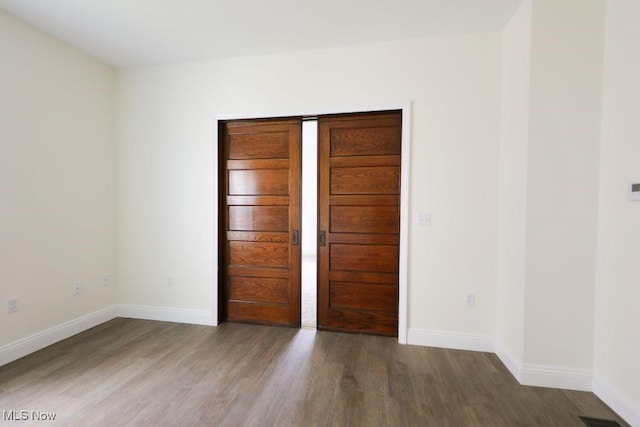 525 Riverside Ave, Wellsville, OH 43968 - spare room with wood finished floors and baseboards