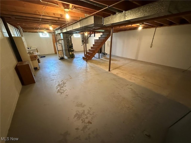122 N Fairview Ave, Dover, OH 44622 - basement with stairway and water heater
