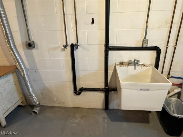 122 N Fairview Ave, Dover, OH 44622 - below grade area with a sink and concrete block wall