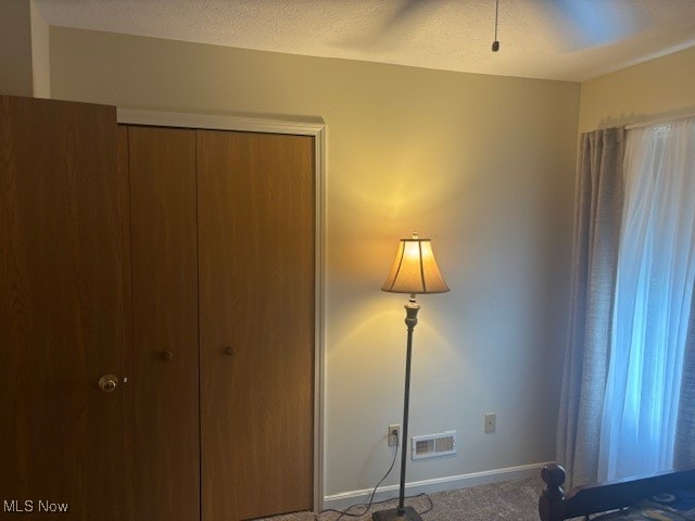 209 Potters Cir, Girard, OH 44420 - unfurnished bedroom featuring carpet flooring and a closet