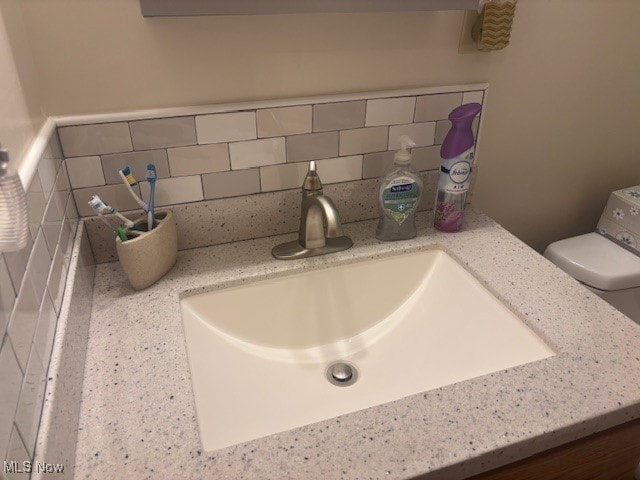 209 Potters Cir, Girard, OH 44420 - bathroom view of decorative backsplash and vanity