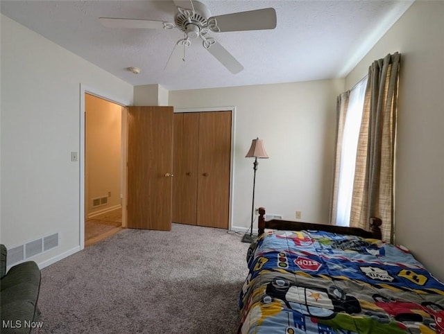 209 Potters Cir, Girard, OH 44420 - bedroom with carpet, a ceiling fan, a textured ceiling, and a closet