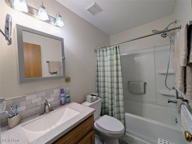 209 Potters Cir, Girard, OH 44420 - bathroom with vanity, shower / bath combo, backsplash, and a textured ceiling
