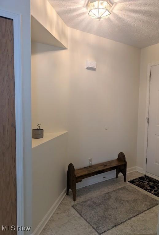 209 Potters Cir, Girard, OH 44420 - interior space with a textured ceiling
