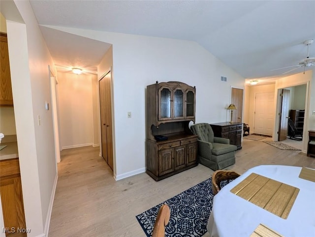 209 Potters Cir, Girard, OH 44420 - living room featuring light wood-style floors, ceiling fan, and lofted ceiling