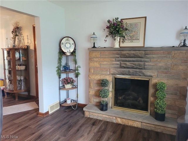 6412 Lieb Dr, New Franklin, OH 44216 - living area with wood finished floors and a stone fireplace