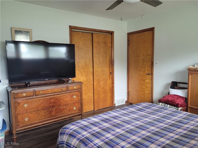 6412 Lieb Dr, New Franklin, OH 44216 - bedroom with dark wood-type flooring, a closet, and ceiling fan