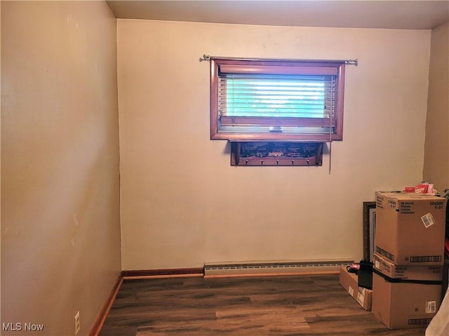 6412 Lieb Dr, New Franklin, OH 44216 - spare room featuring baseboard heating and wood finished floors
