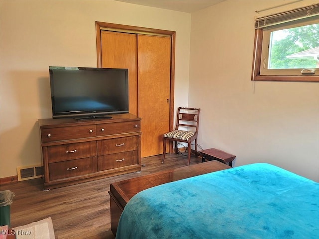 6412 Lieb Dr, New Franklin, OH 44216 - bedroom with dark wood finished floors and a closet