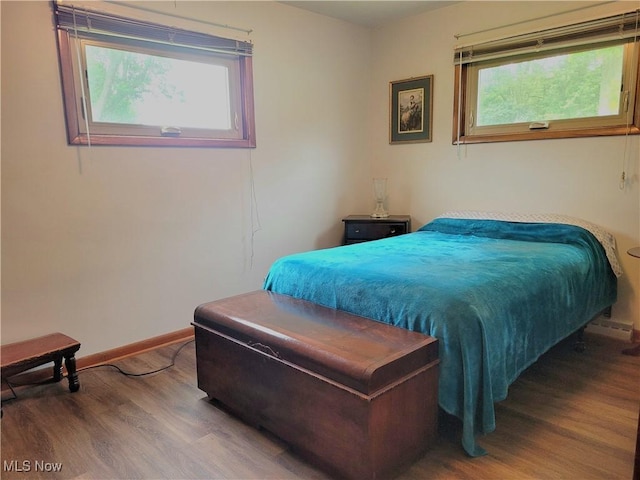 6412 Lieb Dr, New Franklin, OH 44216 - bedroom featuring wood finished floors and baseboards