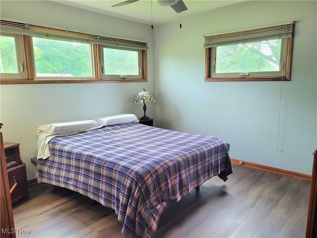6412 Lieb Dr, New Franklin, OH 44216 - bedroom with wood finished floors, multiple windows, and ceiling fan