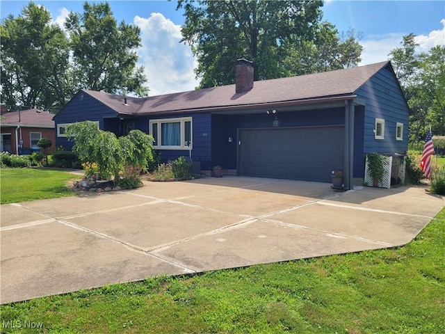 6412 Lieb Dr, New Franklin, OH 44216 - ranch-style home with concrete driveway, an attached garage, a chimney, and a front lawn
