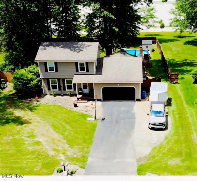 133 Argali Pl, Cortland, OH 44410 - view of front of home featuring a garage and driveway