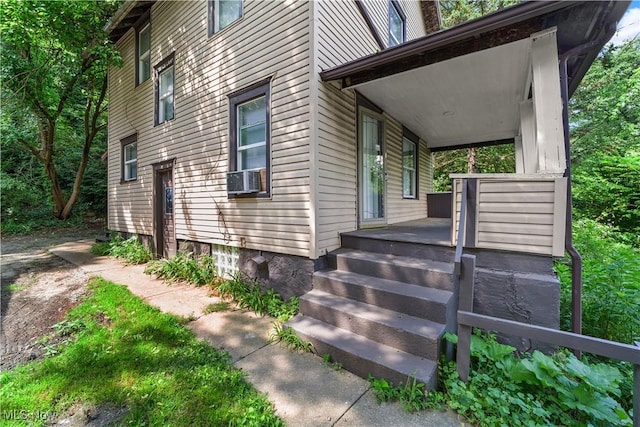 677 Sharon St, Akron, OH 44314 - view of side of home with a porch and cooling unit