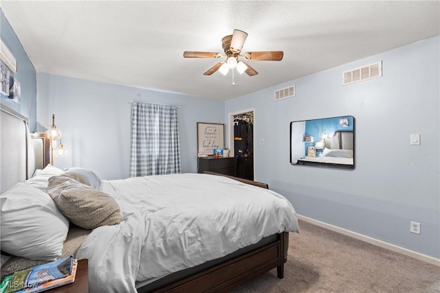 430 County Road 47, Toronto, OH 43964 - bedroom featuring a closet, carpet flooring, a ceiling fan, and a walk in closet