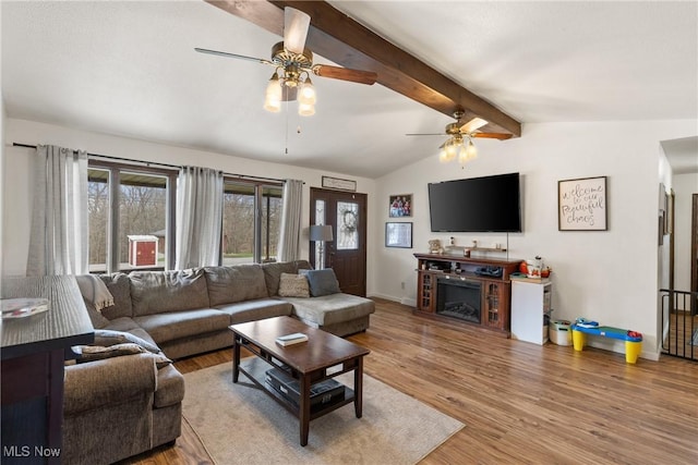 430 County Road 47, Toronto, OH 43964 - living area with a ceiling fan, wood finished floors, and a fireplace