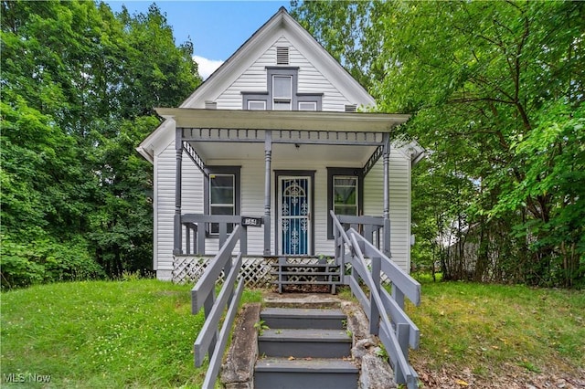 364 Campbell St, Akron, OH 44307 - view of front of house with a front yard and a porch