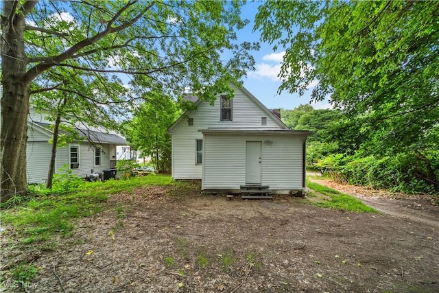 364 Campbell St, Akron, OH 44307 - back of house with entry steps and a chimney
