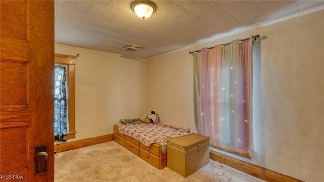 221 N 9th St, Cambridge, OH 43725 - carpeted bedroom with ornamental molding and baseboards
