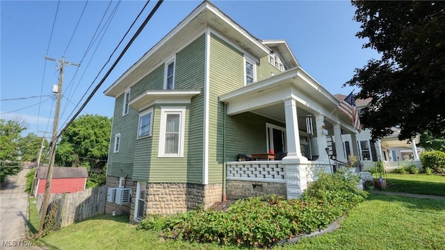 221 N 9th St, Cambridge, OH 43725 - view of property exterior featuring covered porch and a cooling unit
