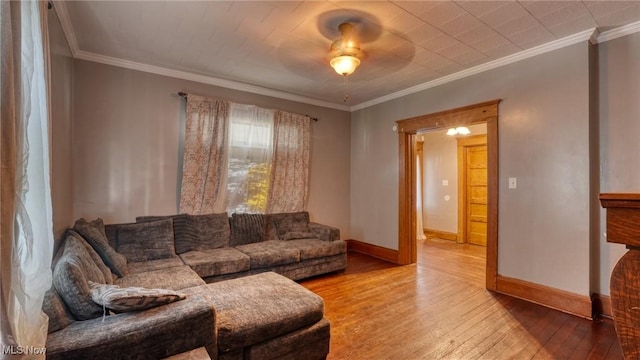 221 N 9th St, Cambridge, OH 43725 - living room featuring wood-type flooring, crown molding, and a ceiling fan