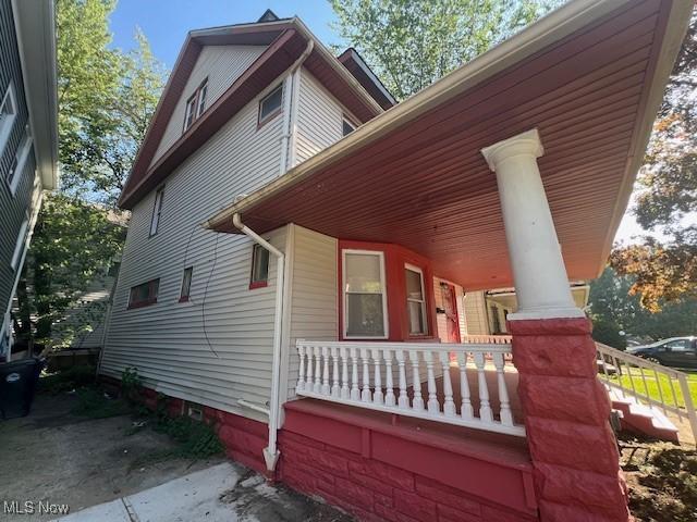 12208 Ingomar Ave, Cleveland, OH 44108 - view of property exterior with a porch