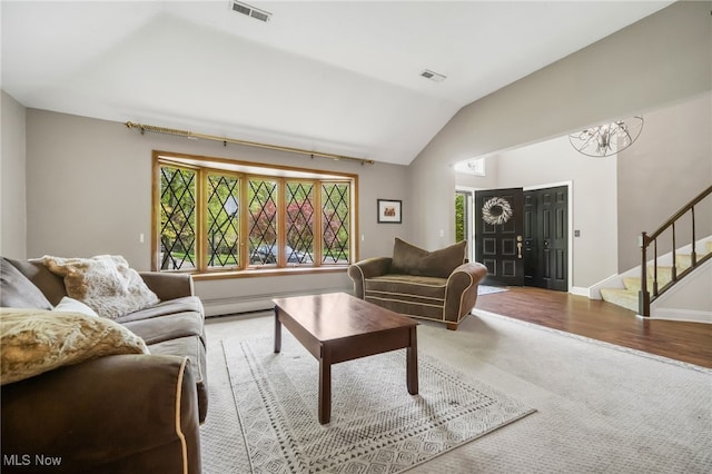5108 Great Oaks Pkwy, Independence, OH 44131 - living room featuring vaulted ceiling, plenty of natural light, stairs, a chandelier, and carpet flooring