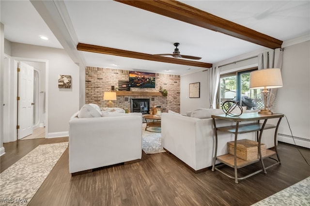 5108 Great Oaks Pkwy, Independence, OH 44131 - living room with beam ceiling, dark wood-type flooring, a ceiling fan, a fireplace, and brick wall
