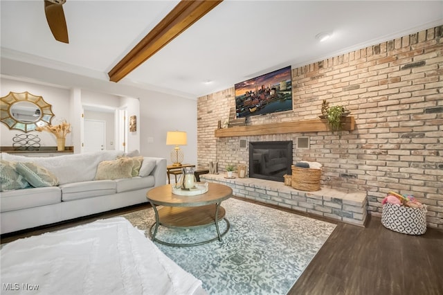 5108 Great Oaks Pkwy, Independence, OH 44131 - living room with brick wall, wood finished floors, a fireplace, and beam ceiling