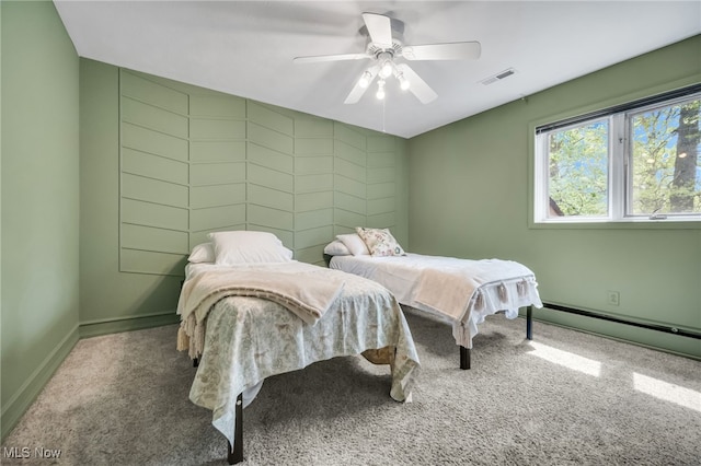 5108 Great Oaks Pkwy, Independence, OH 44131 - carpeted bedroom with baseboard heating and ceiling fan