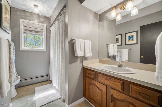 5108 Great Oaks Pkwy, Independence, OH 44131 - bathroom with baseboard heating and vanity