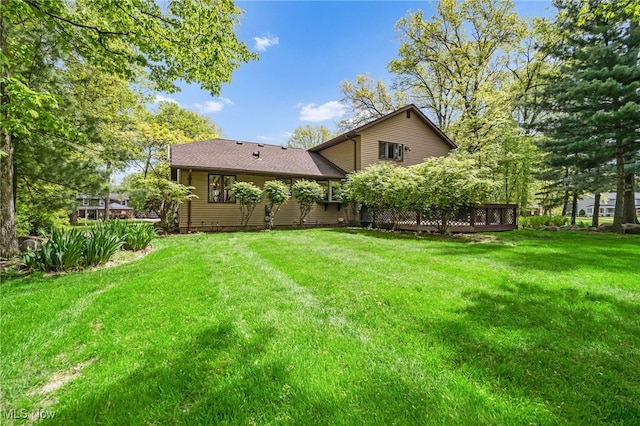 5108 Great Oaks Pkwy, Independence, OH 44131 - view of green lawn with a wooden deck
