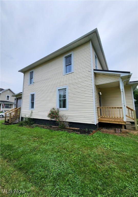 600 Orchard Ave, Cambridge, OH 43725 - back of property featuring a yard
