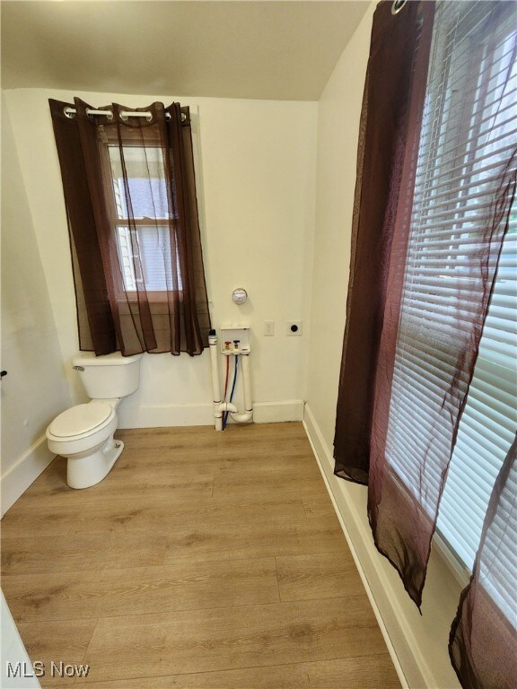 600 Orchard Ave, Cambridge, OH 43725 - bathroom featuring toilet and wood finished floors