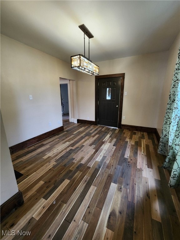 600 Orchard Ave, Cambridge, OH 43725 - unfurnished dining area featuring dark wood finished floors