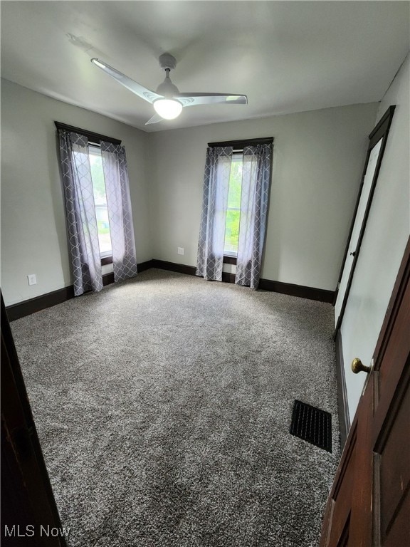 600 Orchard Ave, Cambridge, OH 43725 - carpeted empty room featuring baseboards and a ceiling fan