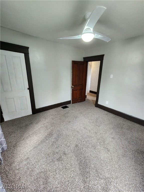 600 Orchard Ave, Cambridge, OH 43725 - unfurnished bedroom featuring carpet floors and a ceiling fan