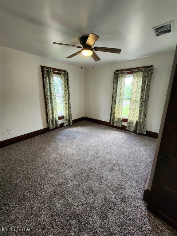 600 Orchard Ave, Cambridge, OH 43725 - carpeted spare room featuring a ceiling fan and plenty of natural light