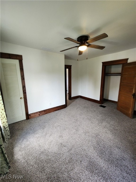 600 Orchard Ave, Cambridge, OH 43725 - unfurnished bedroom featuring carpet, ceiling fan, and a closet