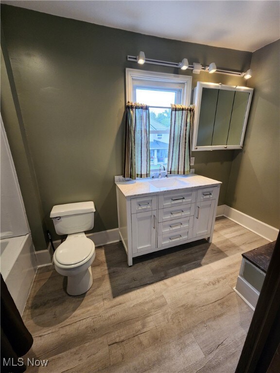 600 Orchard Ave, Cambridge, OH 43725 - bathroom featuring vanity and wood finished floors