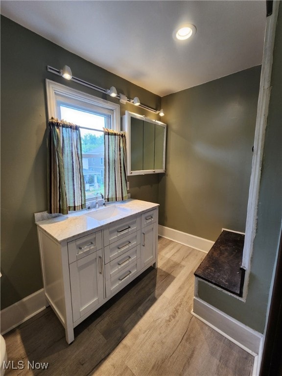 600 Orchard Ave, Cambridge, OH 43725 - full bath with vanity, wood finished floors, and recessed lighting