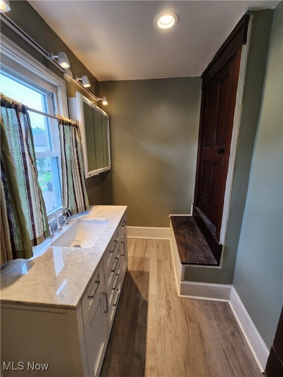 600 Orchard Ave, Cambridge, OH 43725 - bathroom featuring wood finished floors, vanity, and recessed lighting