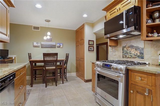 2925 Millboro Rd, Silver Lake, OH 44224 - kitchen featuring appliances with stainless steel finishes, tasteful backsplash, brown cabinetry, light stone countertops, and recessed lighting
