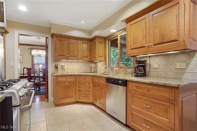 2925 Millboro Rd, Silver Lake, OH 44224 - kitchen with stainless steel appliances, light stone countertops, brown cabinets, crown molding, and decorative backsplash